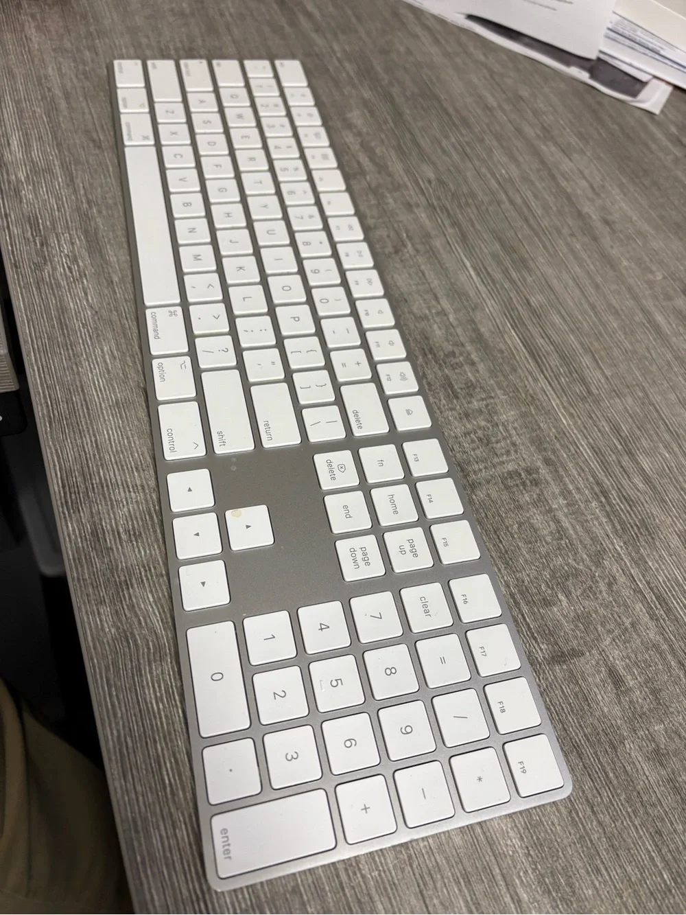 Apple Magic Keyboard in Silver and White lightning cable